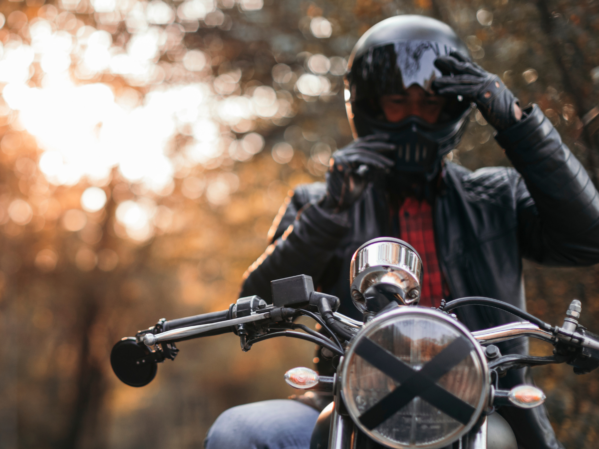 A motorcycle rider wearing a helmet.